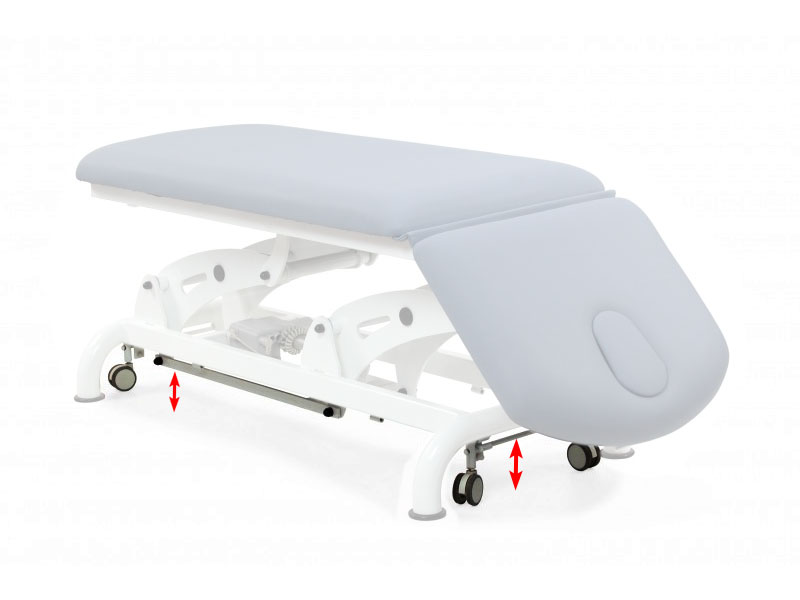 Retractable wheel system for treatment tables 501
