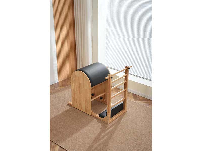 Dispositivo a botte per Pilates per sostenere e sfidare il corpo durante l'esercizio